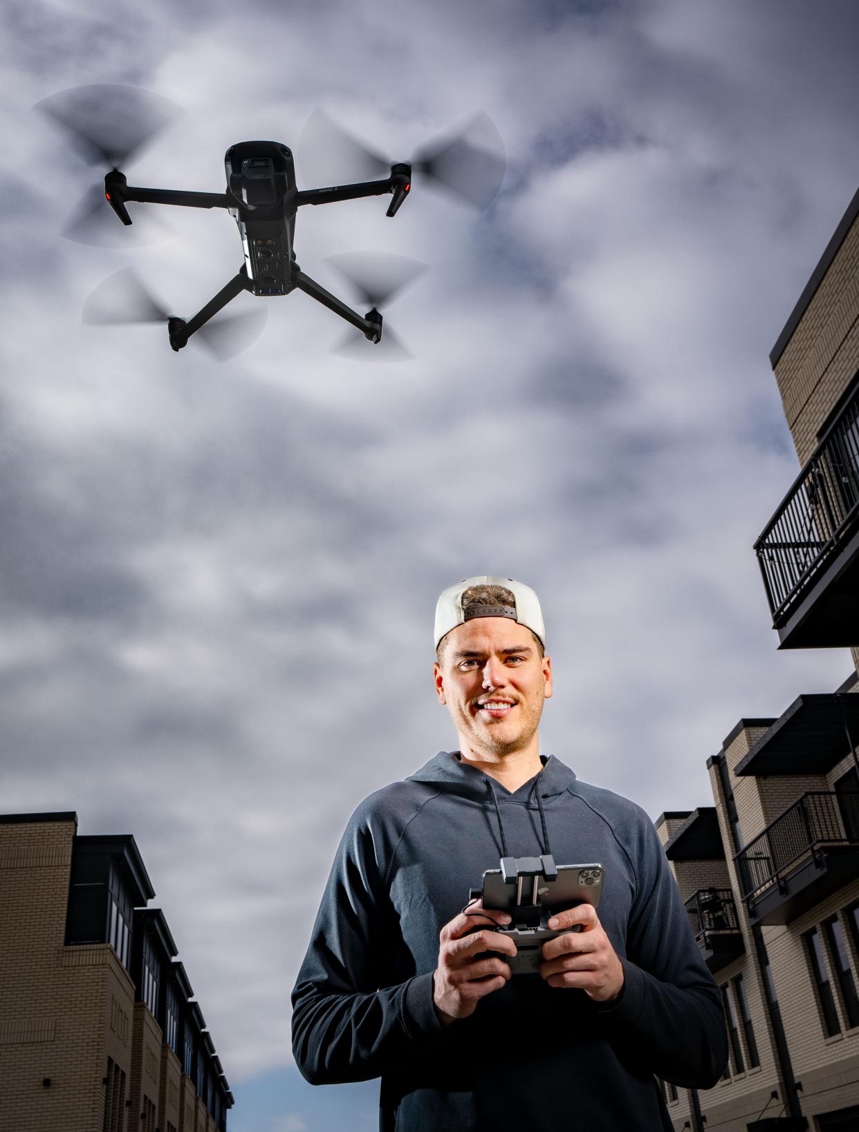 Drone pilot Drew Dau flies his drone near his home in Des Moines.