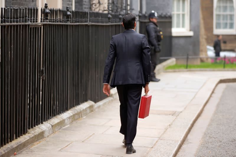 Britain's Chancellor of the Exchequer Sunak presents the budget box in London