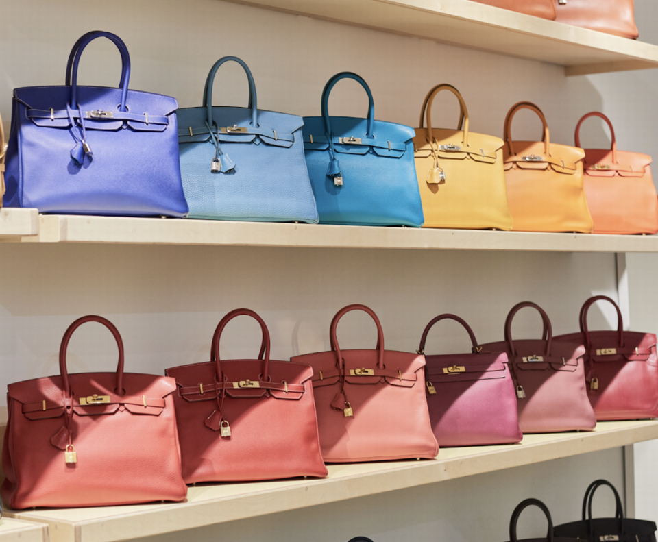 The Miami used handbag store Rebag displays a wall of Hermès’ signature Birkin bags.