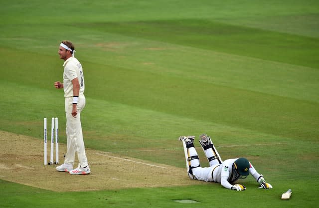 Pakistan’s Mohammad Abbas makes it back to his crease as England’s Stuart Broad attempts to run him out