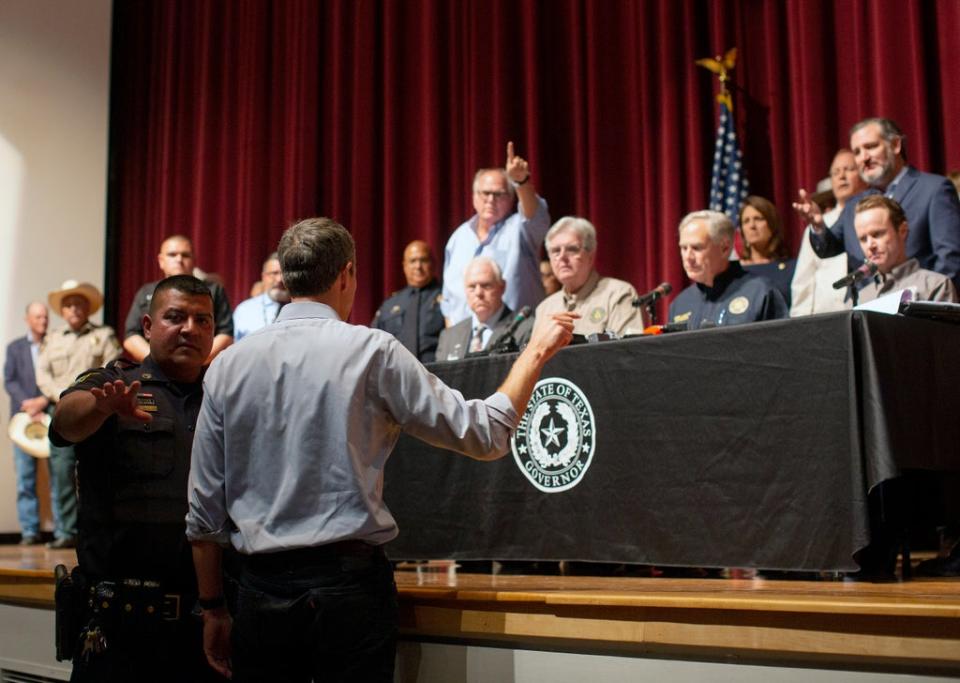 Democrat Beto O'Rourke, who is running against Greg Abbott for governor in 2022, interrupts a news conference headed by Texas Gov. Greg Abbott in Uvalde, Texas Wednesday, May 25, 2022. (AP Photo/Dario Lopez-Mills) (AP)