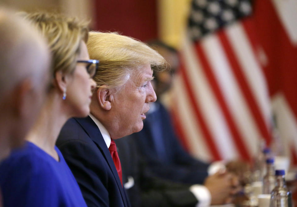 U.S President Donald Trump attends a business roundtable event with British Prime Minister Theresa May at St. James's Palace, London, Tuesday June 4, 2019. (AP Photo/Tim Ireland)