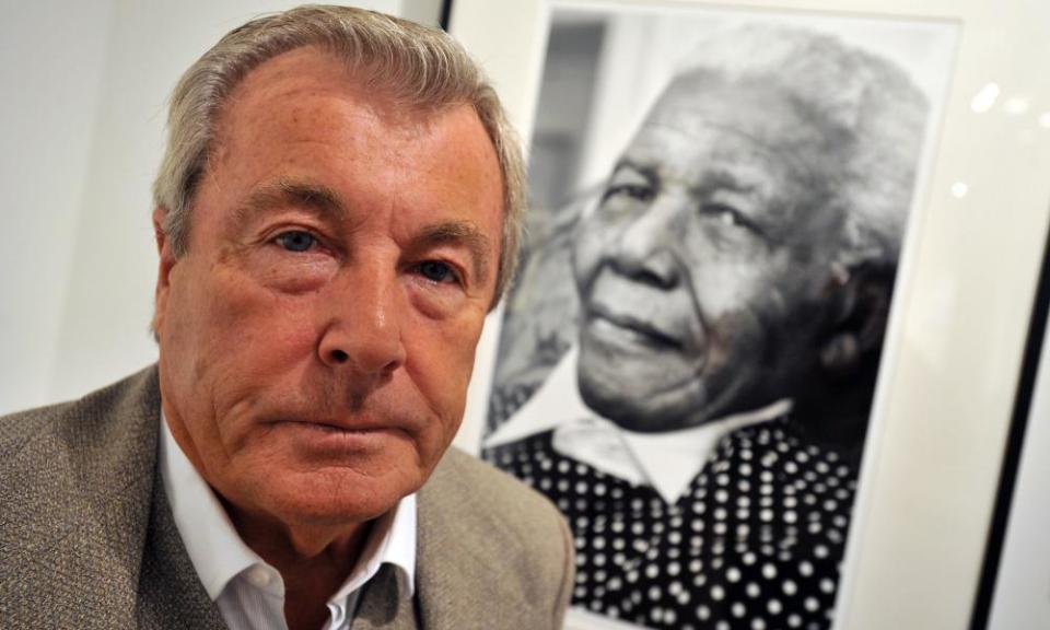 Terry O’Neill in front of his work ‘Nelson Mandela at 90’ in 2009.