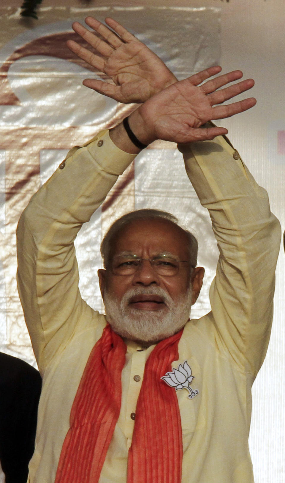 Indian Prime Minister Narendra Modi, greets supporters during an election rally in Mathurapur, south of Kolkata, India, Thursday, May 16, 2019. (AP Photo/Bikas Das)