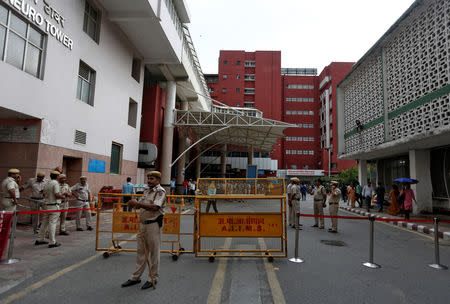 Police stand inside the premises of All India Institute of Medical Sciences (AIIMS) where former Prime Minister Atal Bihari Vajpayee was undergoing treatment in New Delhi, August 16, 2018. REUTERS/Adnan Abidi