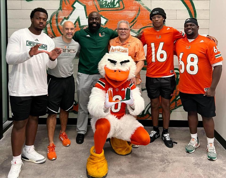 The Hurricanes Team Store and UM joined forces to host an annual shopping spree that honors the legacy of late Miami Hurricanes defensive lineman Bryan Pata. Pictured are, from left, UM defensive end Rueben Bain, director of player development Jorge Baez, UM senior analyst/defense Edwin Pata, The Hurricanes Team Store general manager Harry Rothwell, receiver Isaiah Horton and offensive lineman Ian Johnson.