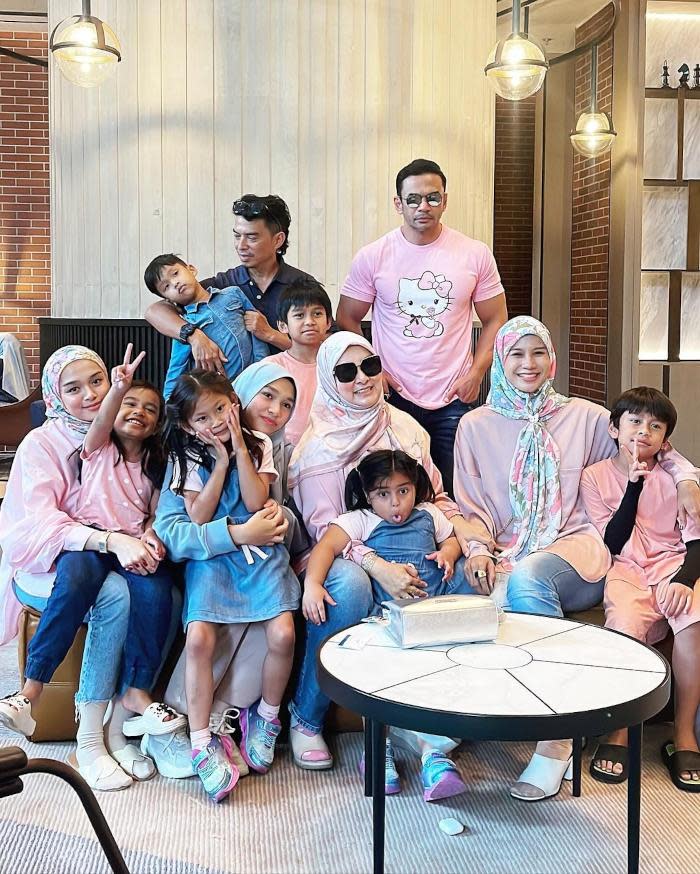 Abby and ex-husband Norman Hakim work with each other to take care of their big families