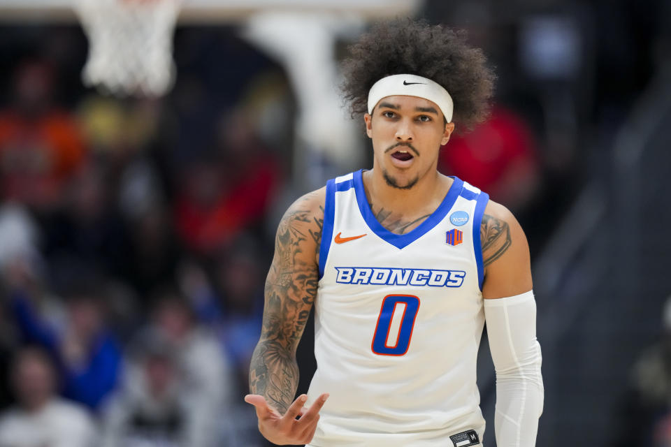 Boise State guard Roddie Anderson III reacts to making a 3-point shot during the first half of a First Four game in the NCAA men's college basketball tournament against Boise State, Wednesday, March 20, 2024, in Dayton, Ohio. (AP Photo/Aaron Doster)