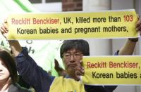 Protestors who claim that a sterilising hygiene product made by Reckitt Benckiser has led to deaths in South Korea, demonstrate ahead of the company's annual general meeting in London, Britain May 5, 2016. REUTERS/Toby Melville