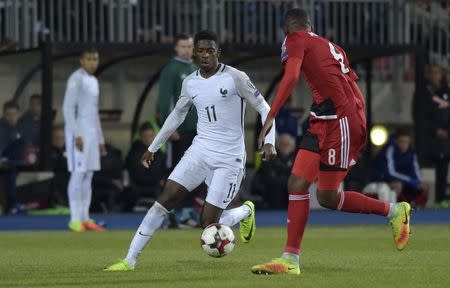 Football Soccer - Luxembourg v France - 2018 World Cup Qualifying European Zone - Group A - Josy-Barthel Stadium, Luxembourg, Luxembourg - 25/3/17 France's Ousmane Dembele in action with Luxembourg's Christopher Martins Pereira Reuters / Eric Vidal Livepic