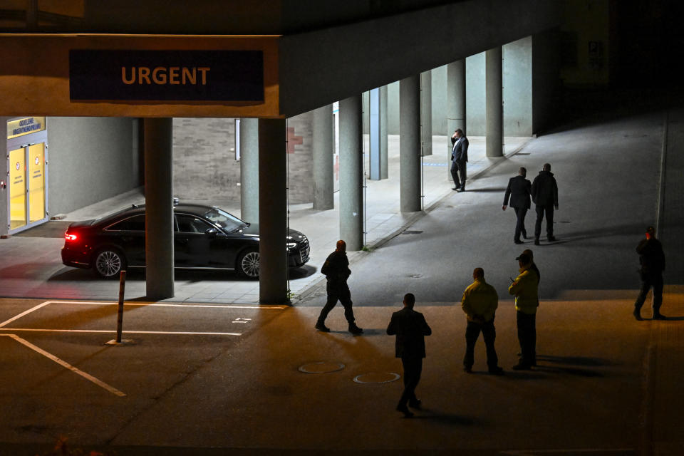 Police and officials stand outside the entrance of the emergency room of the F. D. Roosevelt University Hospital, where Slovak Prime Minister Robert Fico, who was shot and injured, is treated in Banska Bystrica, central Slovakia, Wednesday, May 15, 2024. Slovak Prime Minister Robert Fico is in life-threatening condition after being wounded in a shooting after a political event Wednesday afternoon, according to his Facebook profile.(AP Photo/Denes Erdos)