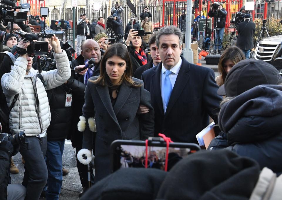 Michael Cohen, President Donald Trump's former personal lawyer, arrives with daughter Samantha Blake Cohen and wife Laura Shusterman, at right, at U.S. District Court New York on Dec. 12, 2018. He was to be sentenced for campaign-finance violations and lying to Congress.