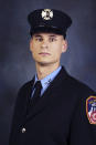 FILE - This undated, file photo provided on April 9, 2019, by the Fire Department of New York shows firefighter Christopher Slutman. The 15-year member of the Fire Department was among three American service members killed by a roadside bomb in Afghanistan on Monday, April 8. (Fire Department of New York via AP, File)