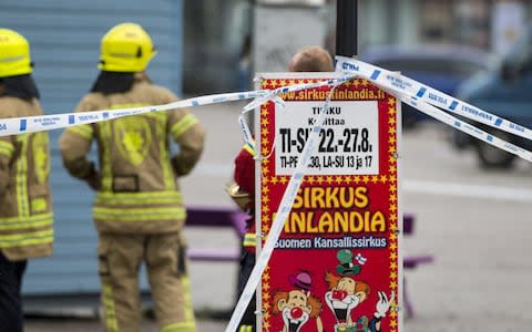 Rescue personnel cordon the place where several people were stabbed, at Turku Market Square - Credit: LEHTIKUVA/Roni Lehti via REUTERS