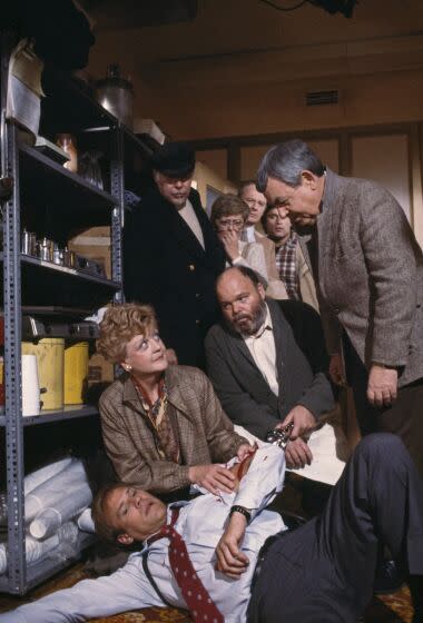 LOS ANGELES - MARCH 17: (Pictured left to right) Don Stroud (as Carey Drayson, on ground) Angela Lansbury (as mystery writer Jessica Fletcher), Albert Salmi (as Joe Downing), Mills Watson (as Ralph Leary, kneeling), Rue McClanahan (as Miriam Radford), Larry Linville (as Prof. Kent Radford), Terence Knox (as Steve Pascal) and Tom Bosley (as Sheriff Amos Tupperstar) star in an episode of the CBS television detective drama "Murder, She Wrote titled "Murder Takes the Bus". The episode originally aired March 17, 1985. (Photo by CBS via Getty Images)