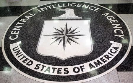 The logo of the U.S. Central Intelligence Agency is shown in the lobby of the CIA headquarters in Langley, Virginia March 3, 2005. U.S. President George W. Bush visited the headquarters for briefings Thursday. REUTERS/Jason Reed JIR