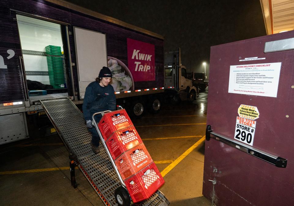 Kwik Trip driver trainee Lucas Hernandez delivers milk from Kwik Trip's La Crosse dairy to Kwik Trip #290, 7880 S. 10th St., in Oak Creek.