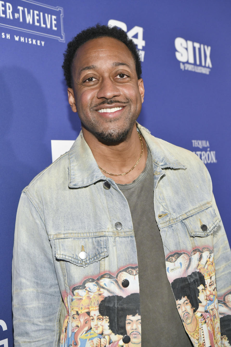 Jaleel White smiles as he's photographed at the Sports Illustrated Super Bowl Party in February 2022