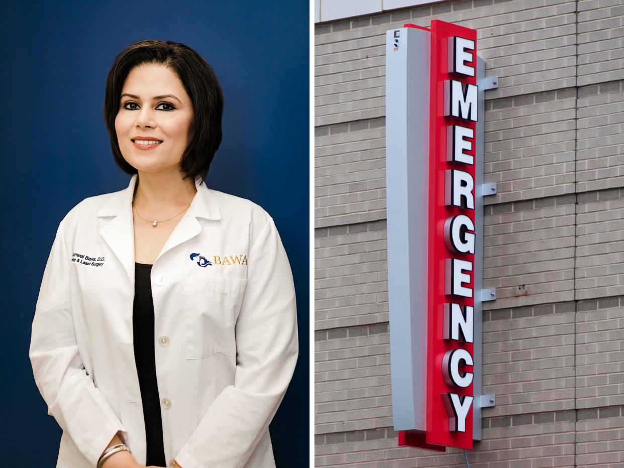 Dr. Kanwal Bawa wearing a white coat and a red and white "Emergency" sign on the wall of a hospital