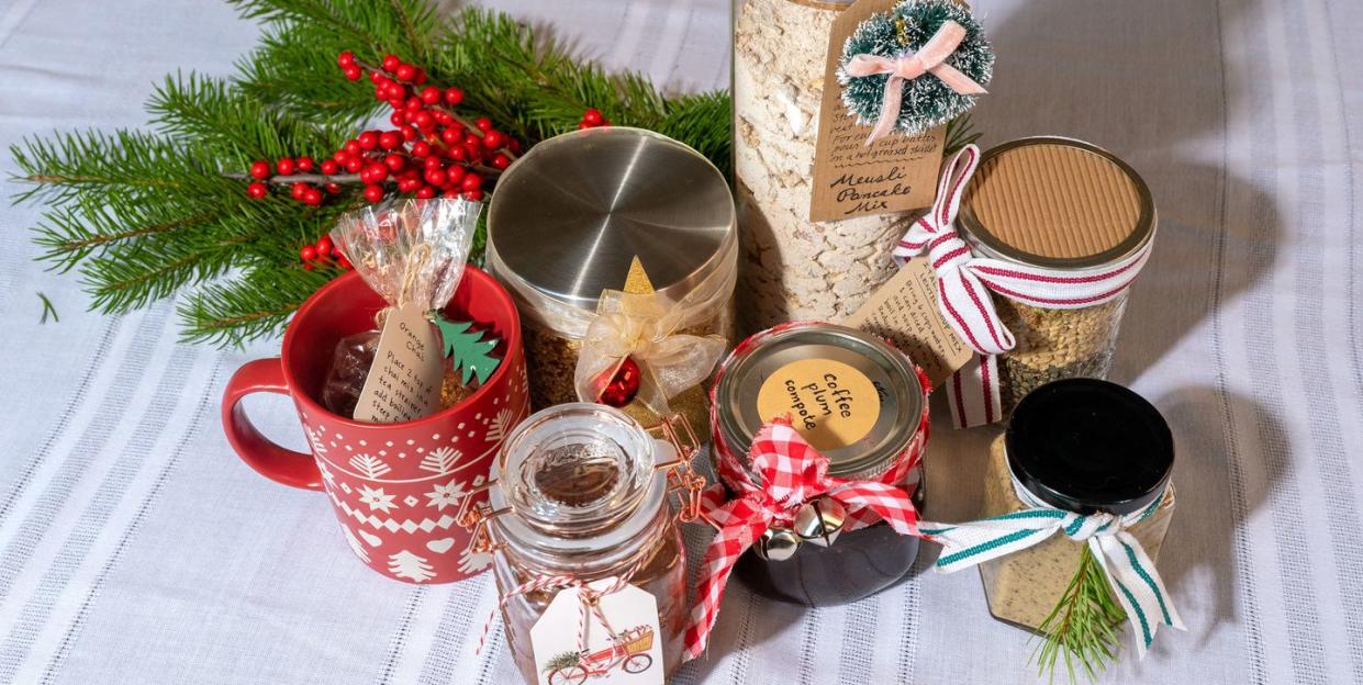 a group of jars filled with edible gifts for cyclists