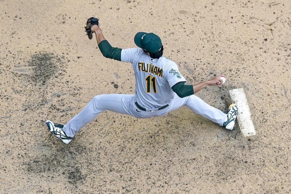 Oakland Athletics relief pitcher Shintaro Fujinami throws during the ninth inning of a baseball game against the Milwaukee Brewers Saturday, June 10, 2023, in Milwaukee. (AP Photo/Morry Gash)