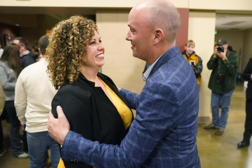 Utah Gov. Spencer Cox hugs Utah 2nd Congressional District Republican nominee Celeste Maloy during an election night party at the Utah Trucking Association Tuesday, Nov. 21, 2023, in West Valley City, Utah. (AP Photo/Rick Bowmer)