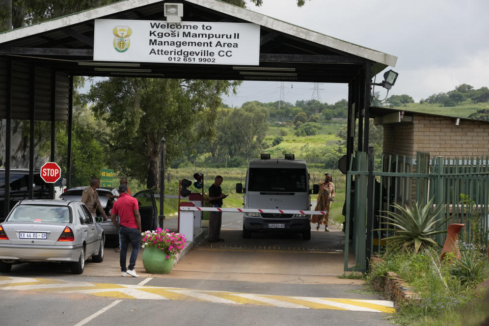 Vehicles come and go at the entrance to the Correctional Services prison in Pretoria, South Africa, Friday, Jan. 5, 2024. South African athlete Oscar Pistorius has been released from prison on parole after serving nearly nine years in prison for killing his girlfriend and is now at home, South Africa’s Department of Corrections said Friday. (AP Photo/Themba Hadebe)