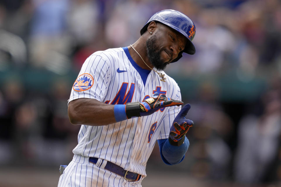 New York Mets' Starling Marte (6) celebrates while running the bases after hitting the go-ahead two-run home run off Cleveland Guardians relief pitcher Trevor Stephan (37) in the eighth inning of the opener of a split doubleheader baseball game, Sunday, May 21, 2023, in New York. (AP Photo/John Minchillo)