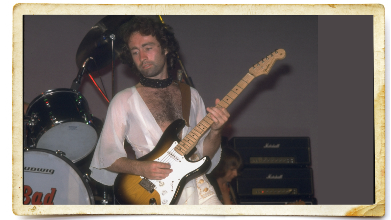  Paul Rodgers playing guitar with Bad Company circa 1980. 