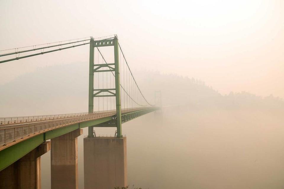 Smoke from the North Complex Fire obscures the air on Bidwell Bar Bridge as it cross Lake Oroville in 2020. Researchers at UC Davis say as wildfire activity has grown, the state’s pristine bodies of water have been affected by smoke.