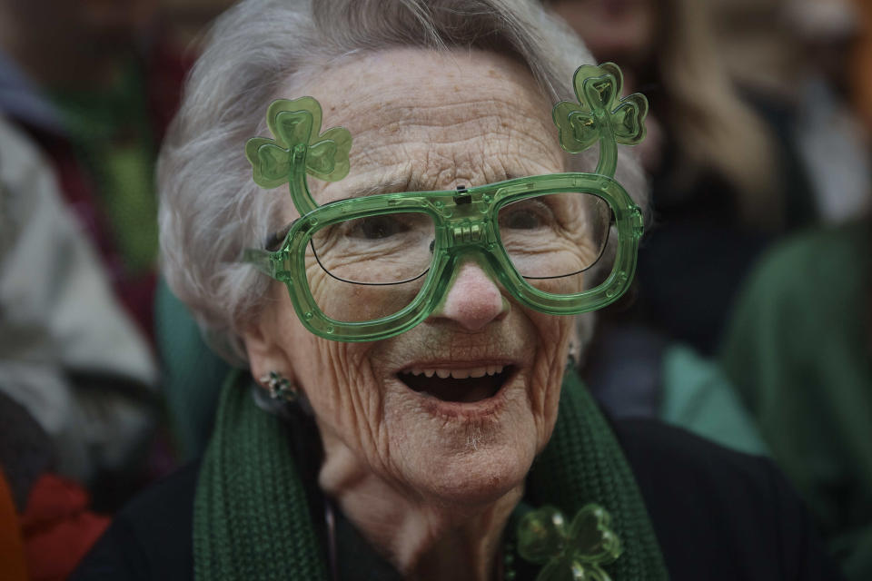 A woman cheers during the St. Patrick's Day Parade on Saturday, March 16, 2024, in New York. (AP Photo/Andres Kudacki)