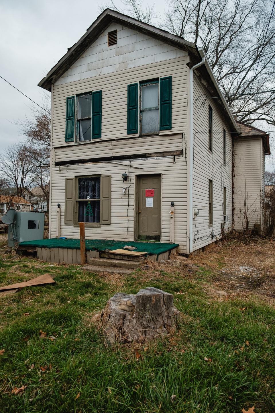 A condemned home at 229 St. Clair Avenue SW is one of many on a list of properties to be addressed by the City of New Philadelphia.