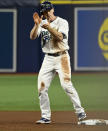 Tampa Bay Rays' Joey Wendle claps from second base after hitting an RBI-double off Miami Marlins' Sandy Alcantara during the fourth inning of a baseball game Saturday, Sept. 25, 2021, in St. Petersburg, Fla. (AP Photo/Steve Nesius)