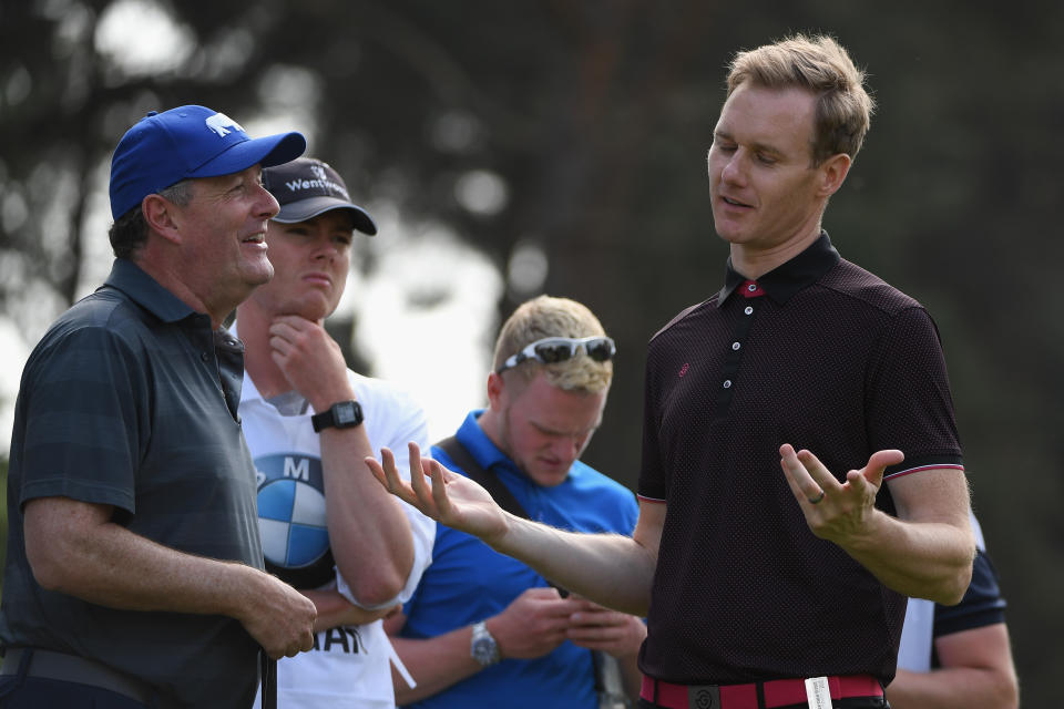 VIRGINIA WATER, ENGLAND - MAY 23:  Piers Morgan chats with Dan Walker during the Pro Am for the BMW PGA Championship at Wentworth on May 23, 2018 in Virginia Water, England.  (Photo by Ross Kinnaird/Getty Images)