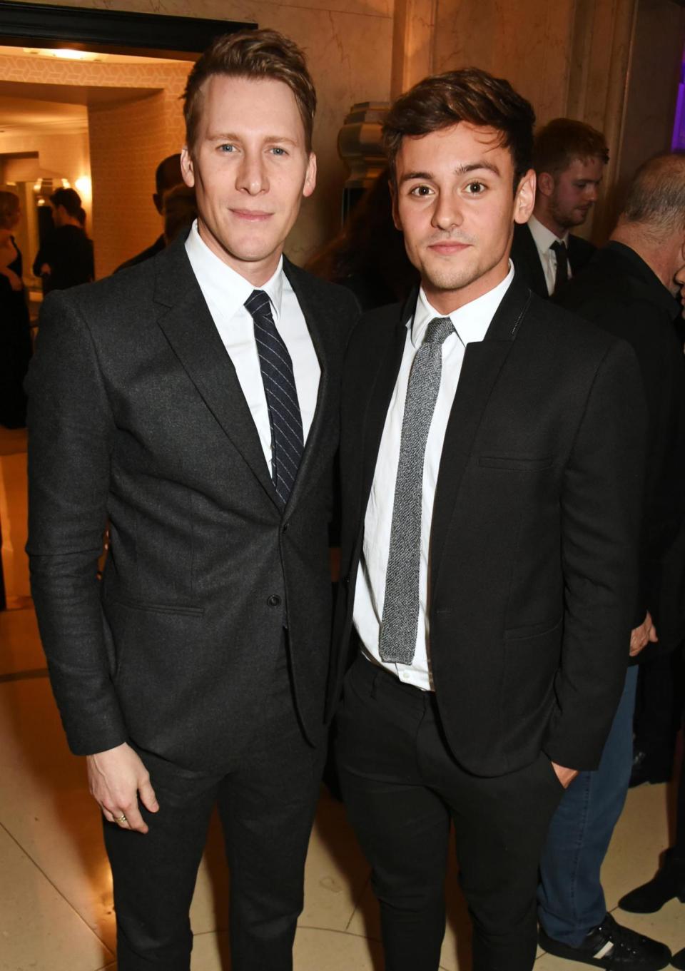 Romance: Tom Daley with his fiancé Dustin Lance Black (Dave Benett)