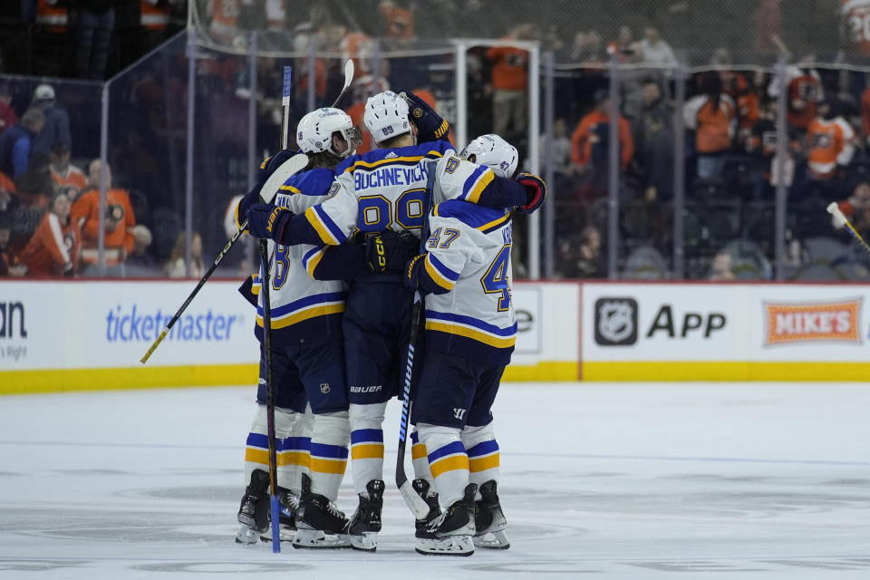 St. Louis Blues' Pavel Buchnevich celebrates with teammates a goal against the Philadelphia Flyers during a shootout in an NHL hockey game, Monday, March 4, 2024, in Philadelphia. (AP Photo/Matt Rourke)