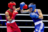 LONDON, ENGLAND - JULY 28: Shiva Thapa of India (L) in action with Oscar Valdez Fierro of Mexico during their Men's Bantam Weight (56kg) bout on Day 1 of the London 2012 Olympic Games at ExCeL on July 28, 2012 in London, England. (Photo by Scott Heavey/Getty Images)