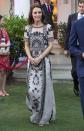 <p>Kate wears a white gown with black embroidery to a garden party celebrating the Queen's 90th birthday in New Dehli. </p>