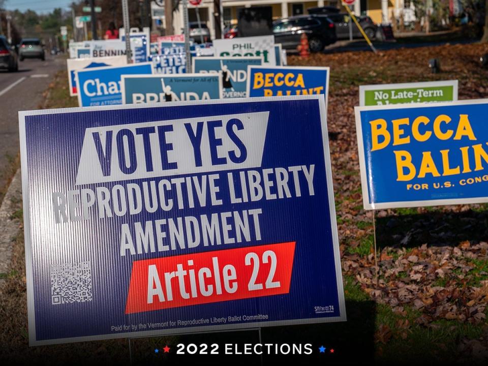 Political candidate and referendum posters are placed along a main road November 2, 2022 in Shelburne, Vermont. A sign in favor of Article 27, which would enshrine reproductive rights in the Vermont state constitution following the US Supreme Court's overturning of Roe v. Wade after 50 years of federal abortion protection.