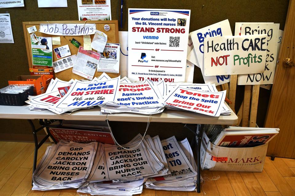 Picket signs wait to be used at strike headquarters on East Central Street.