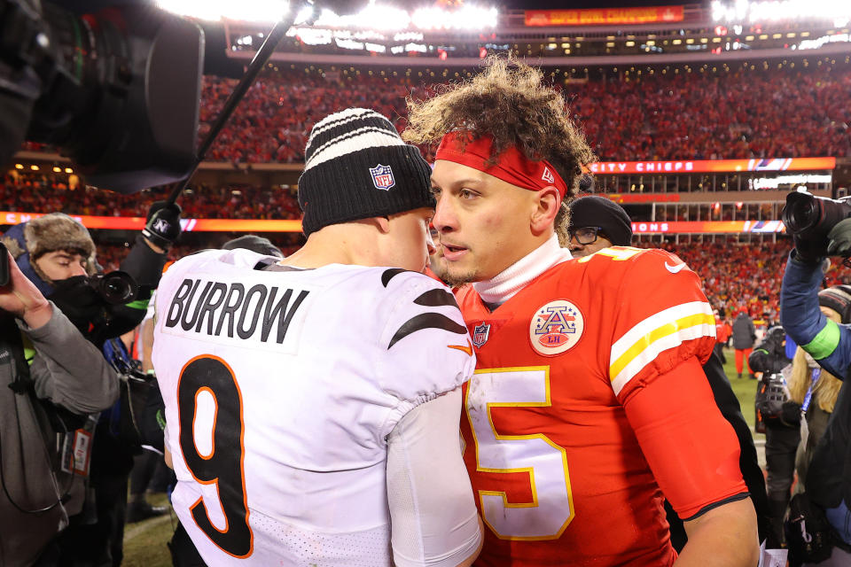 KANSAS CITY, MISSOURI - JANUARY 29: Joe Burrow #9 of the Cincinnati Bengals and Patrick Mahomes #15 of the Kansas City Chiefs meet on the field after the AFC Championship Game at GEHA Field at Arrowhead Stadium on January 29, 2023 in Kansas City, Missouri. (Photo by Kevin C. Cox/Getty Images)