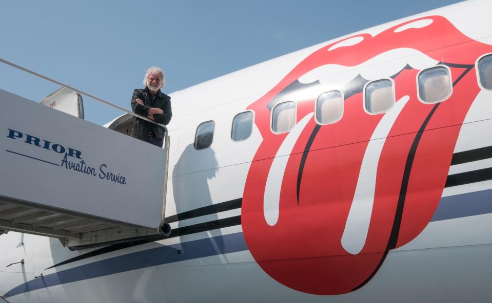 Chuck Leavell gets ready to board the Rolling Stones' private plane for another run of live shows.