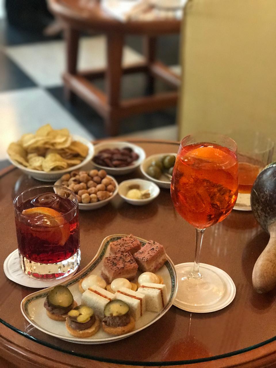 Delicious aperitif and bar snacks before dinner at Belmond Hotel Splendido. 