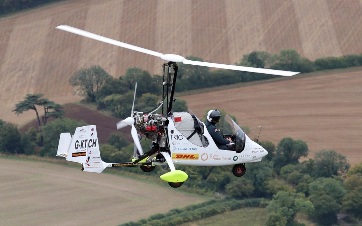 James Ketchell landed at Popham on Sunday after travelling round the world in a gyrocopter - PA