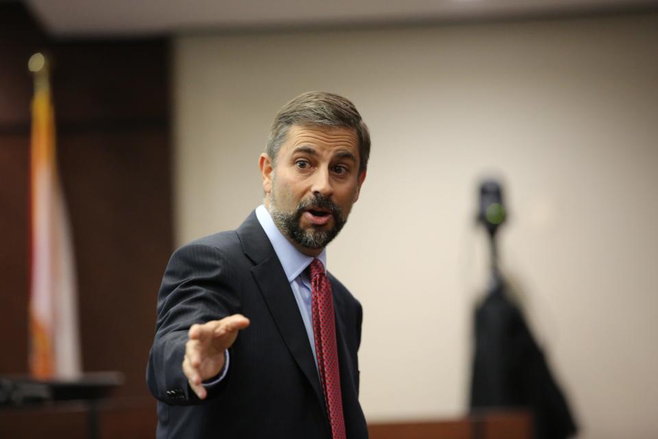 Daniel Rashbaum, Charlie Adelson’s attorney, points to Assistant State Attorneys Sarah Kathryn Dugan and Georgia Cappleman as he presents his opening statement to the jury, Oct. 26, 2023.