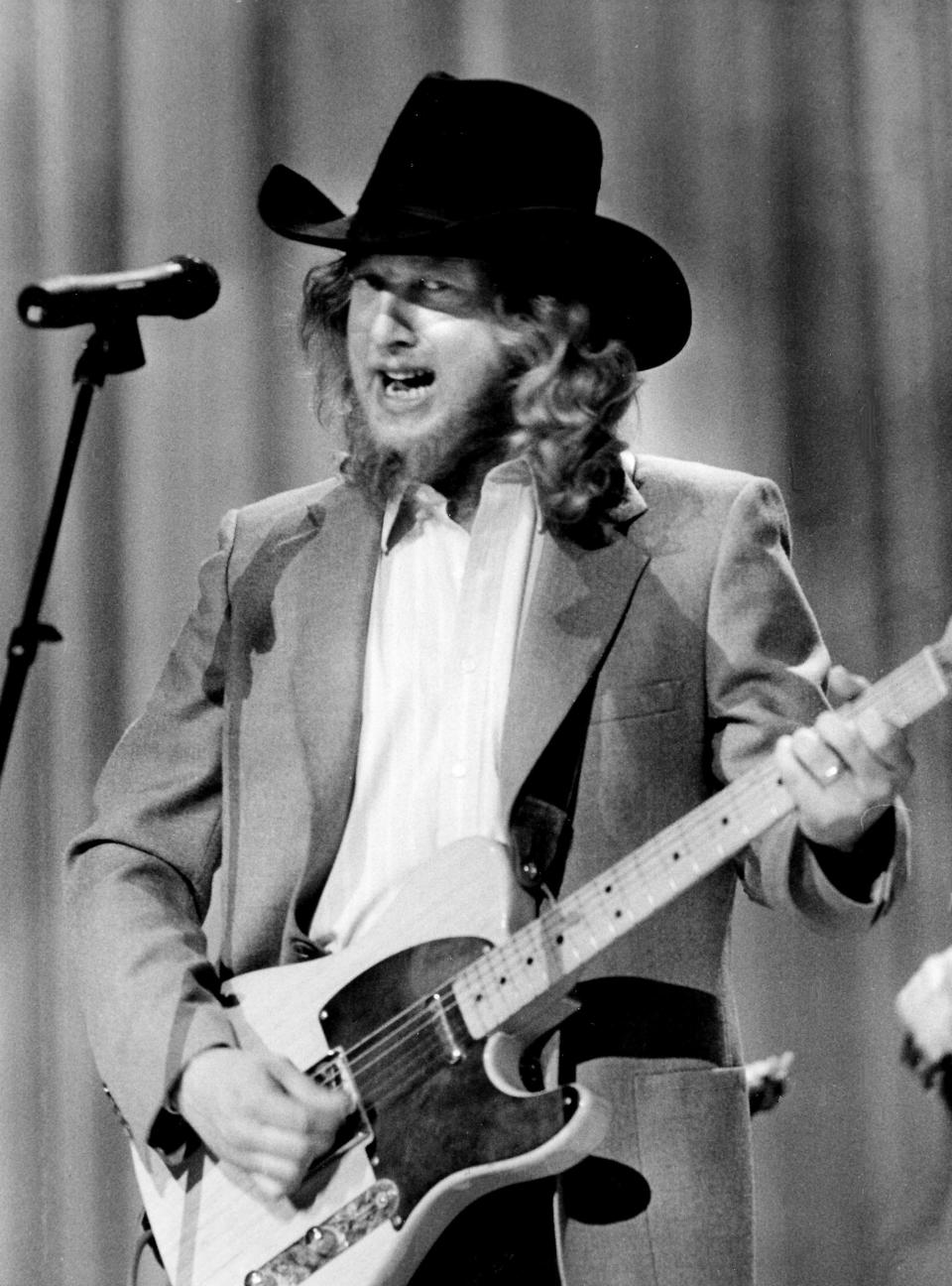 Warner Bros. Records' John Anderson performs the 1983 Top Country Song of the Year, "Swingin'," during the annual Music City News Awards show Jan. 18, 1984 at TPAC. The artist co-wrote the smash hit with his buddy, Lionel Delmore.