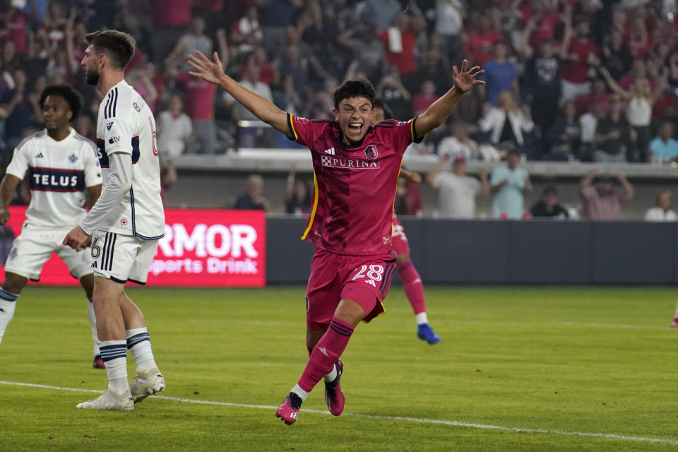 St. Louis City's Miguel Perez (28) celebrates after scoring during the second half of an MLS soccer against the Vancouver Whitecaps match Saturday, May 27, 2023, in St. Louis. (AP Photo/Jeff Roberson)