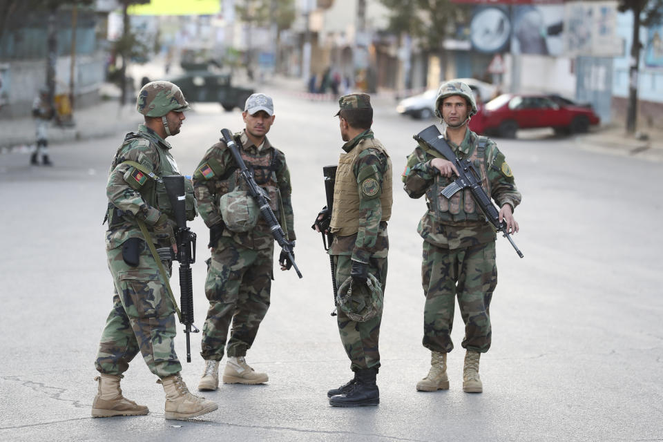 Afghan soldiers stand guard near a polling station in Kabul, Afghanistan, Saturday, Sept. 28, 2019. (AP Photo/Ebrahim Nooroozi)