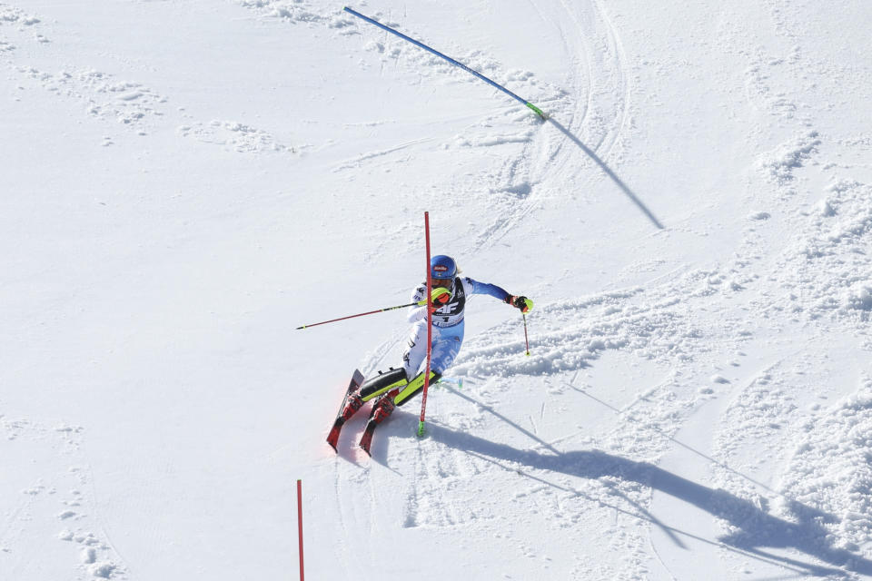 United States' Mikaela Shiffrin speeds down the course on her way to clinch the silver medal in the women's World Championship slalom, in Meribel, France, Saturday Feb. 18, 2023. (AP Photo/Alessandro Trovati)