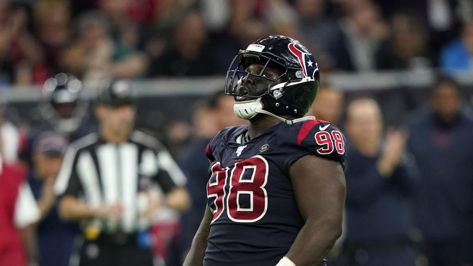 Houston Texans defensive end D.J. Reader (98) reacts after making a tackle against the New England Patriots during the second half of an NFL football game Sunday, Dec. 1, 2019, in Houston. (AP Photo/David J. Phillip)